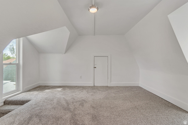 8831 South 400 East Sandy, UT 84070 - Photo 26 of 26 Bonus room featuring lofted ceiling and carpet