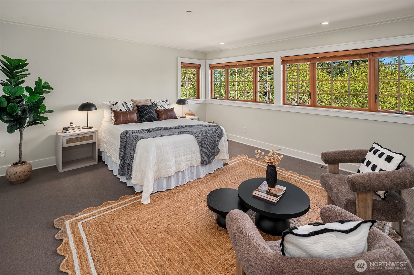8302 Southwest Dilworth Road Vashon, WA 98070 - Photo 23 of 40 a bedroom with furniture and a large window