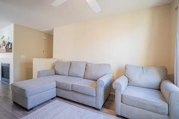 a living room with furniture and a couch