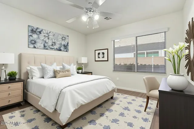 an empty room with wooden floor and closet