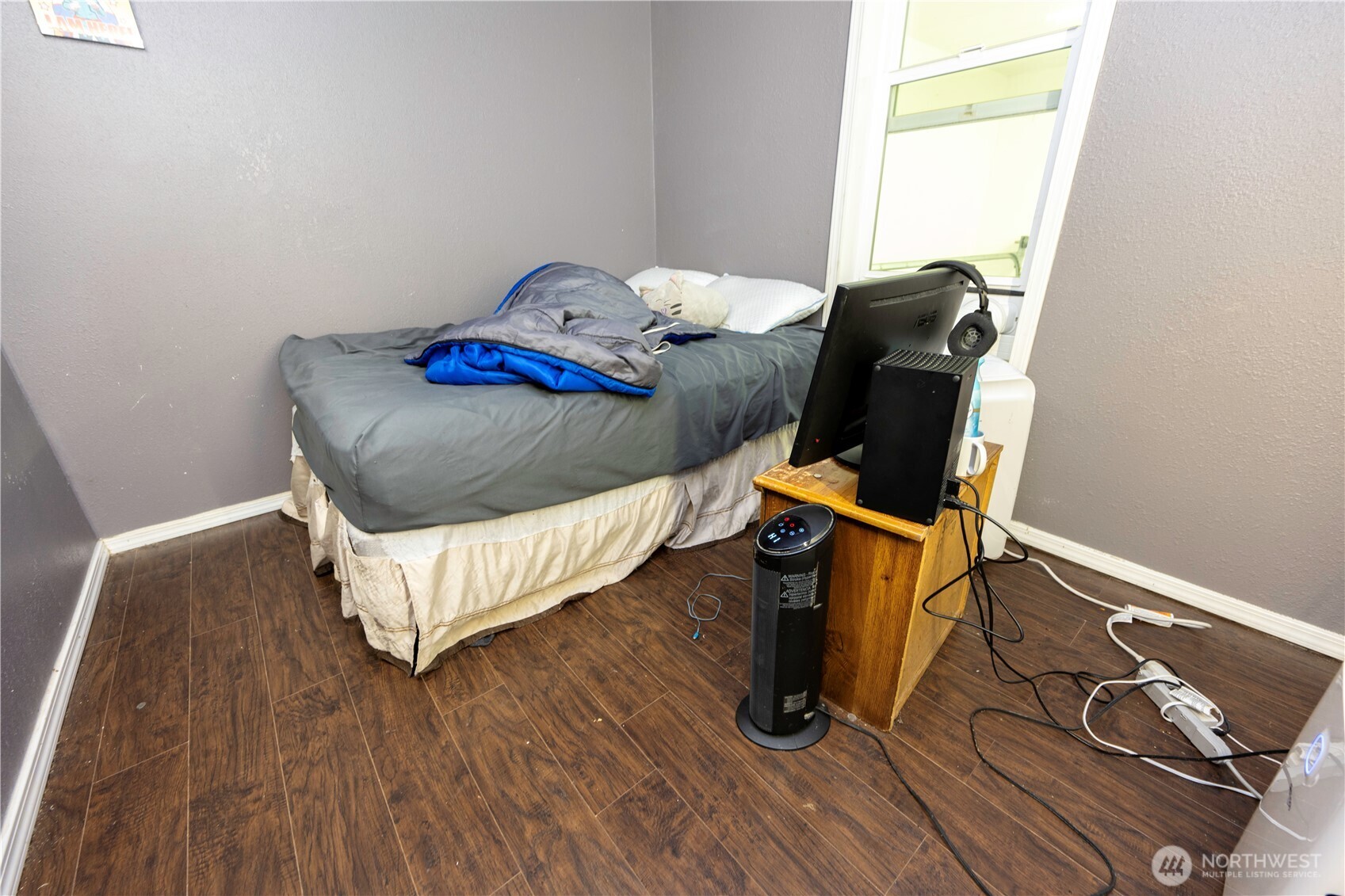 4173 Dover Street Bellingham, WA 98226 - Photo 28 of 40 a bed sitting in a bedroom next to a window