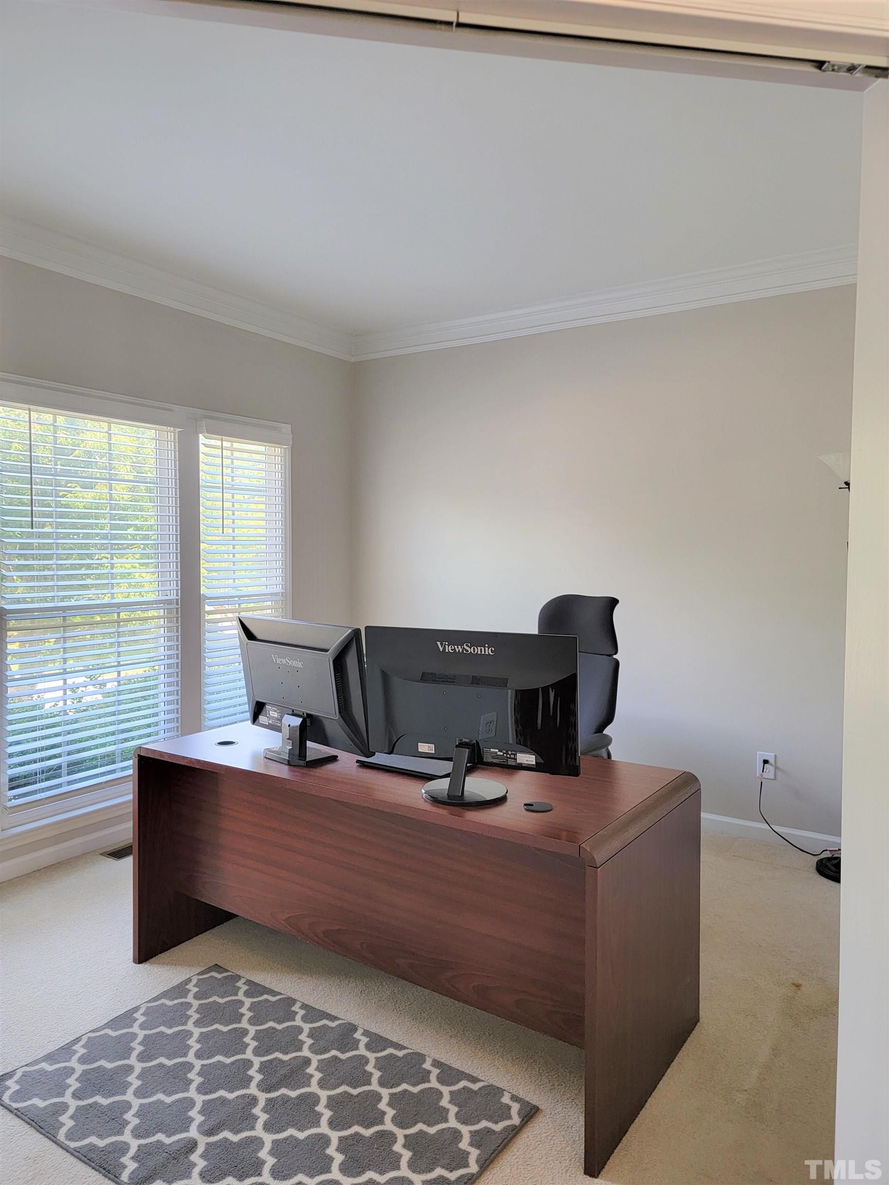 3301 Bellenden Place Raleigh, NC 27604 - Photo 12 of 30 a living room with furniture and window