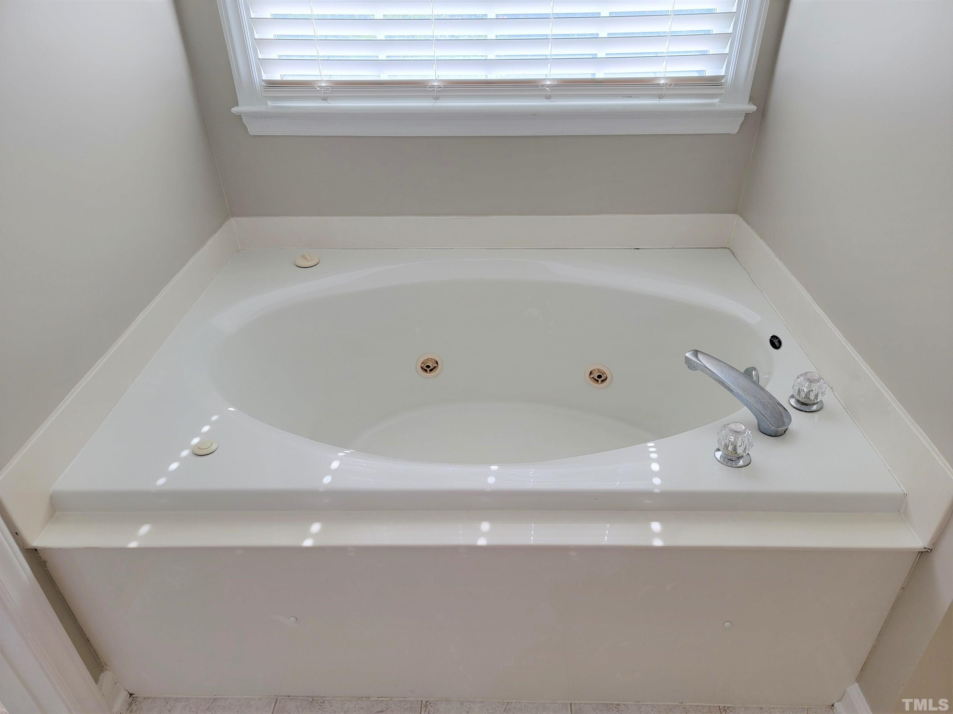 3301 Bellenden Place Raleigh, NC 27604 - Photo 18 of 30 a bathroom with a bathtub