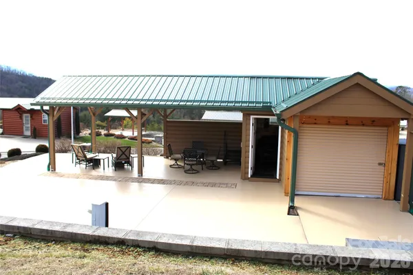 a front view of a house with patio