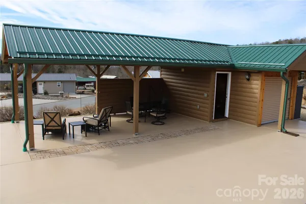 a view of a swimming pool and sitting space