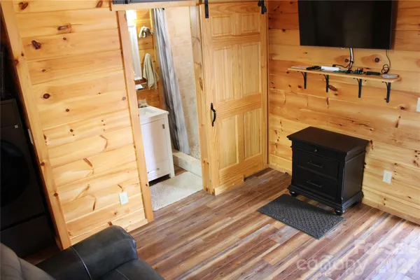 a white toilet sitting next to a bathroom sink
