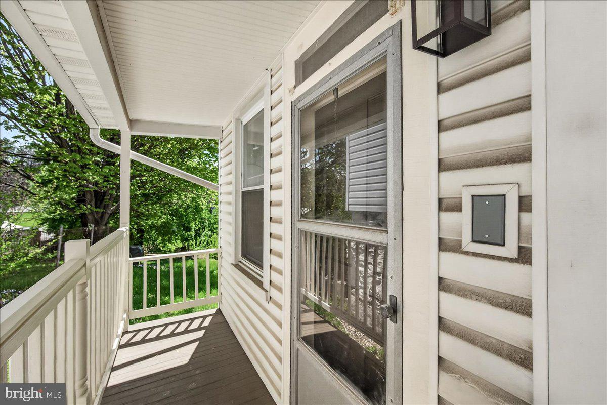 208 East Main Street Middletown, MD 21769 - Photo 29 of 54 Side porch with kitchen entrance