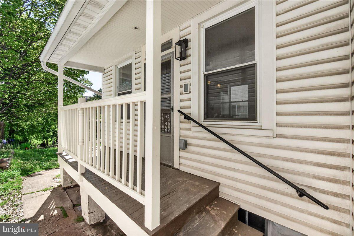 208 East Main Street Middletown, MD 21769 - Photo 30 of 54 Side porch to back yard