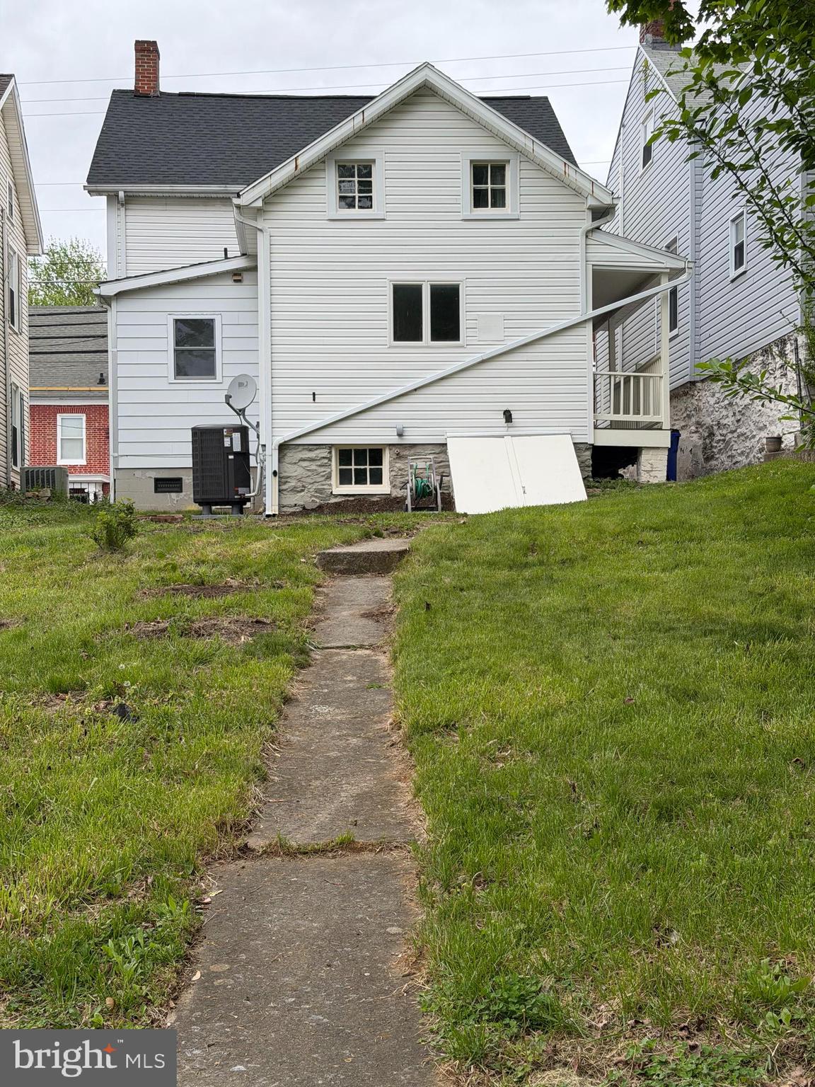 208 East Main Street Middletown, MD 21769 - Photo 35 of 54 Rear of house with basement entrance