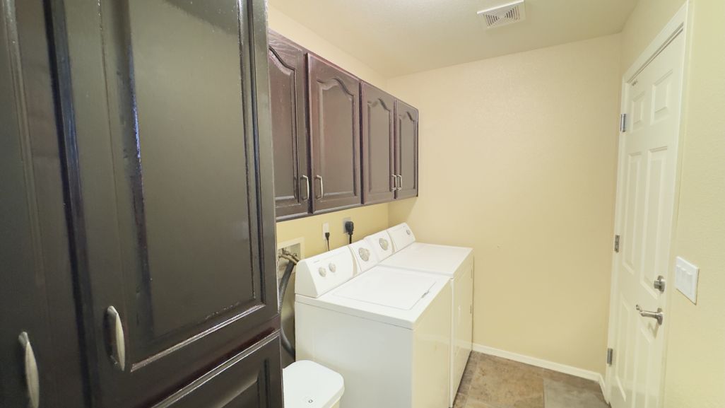 3316 Producers Mine Road Kingman, AZ 86401 - Photo 22 of 35 Laundry area featuring upper cabinetry, and extra pantry right off the kitchen