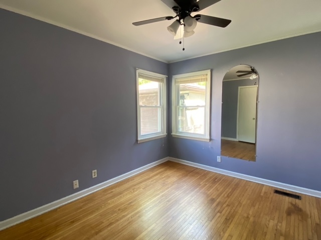 317 South River Road Algonquin, IL 60102 - Photo 6 of 9 a view of an empty room with a window and wooden floor