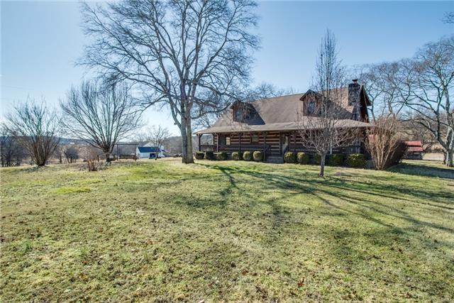 51 Cages Bend Lane Riddleton, TN 37151 - Photo 2 of 20 a view of a house with a yard