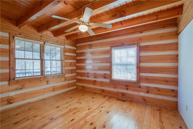 51 Cages Bend Lane Riddleton, TN 37151 - Photo 12 of 20 a view of empty room with wooden floor and fan