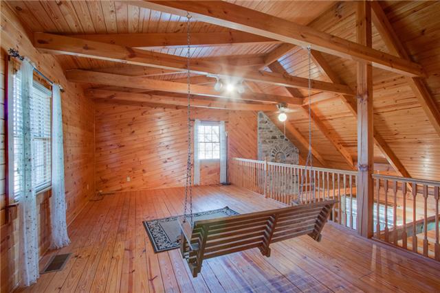 51 Cages Bend Lane Riddleton, TN 37151 - Photo 13 of 20 a balcony with wooden floor
