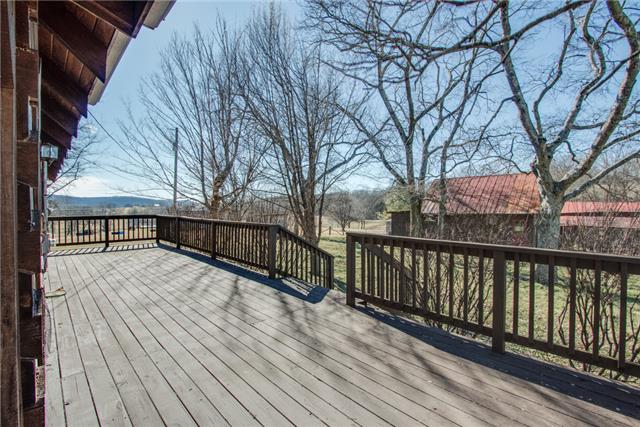 51 Cages Bend Lane Riddleton, TN 37151 - Photo 15 of 20 a view of balcony with wooden floor and fence