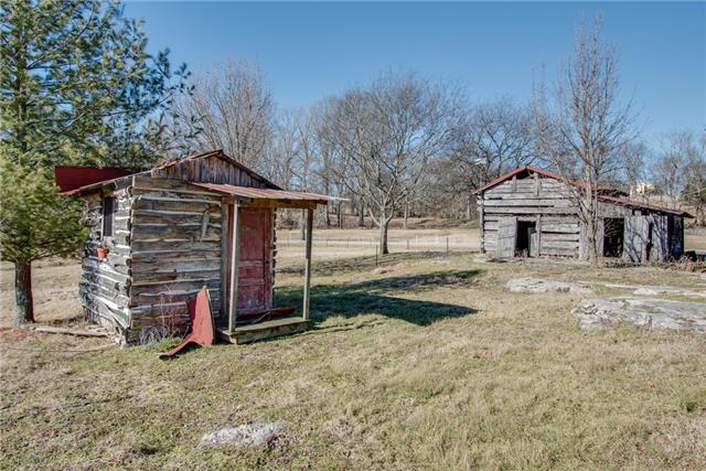 51 Cages Bend Lane Riddleton, TN 37151 - Photo 17 of 20 a front view of a house with garden