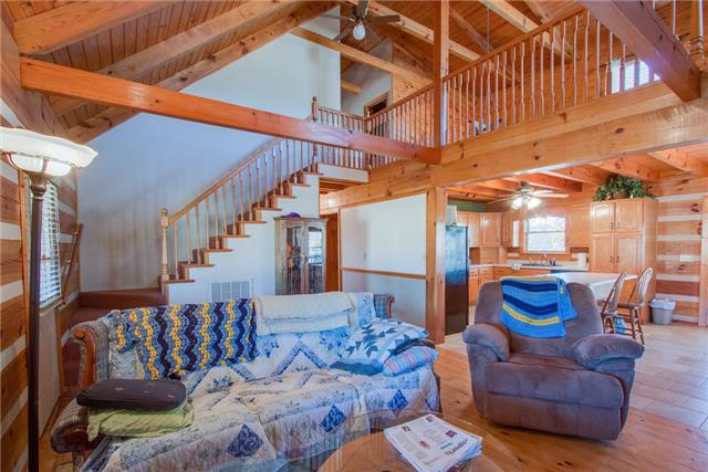 51 Cages Bend Lane Riddleton, TN 37151 - Photo 7 of 20 a view of entryway and hall with wooden floor