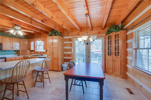 51 Cages Bend Lane Riddleton, TN 37151 - Photo 8 of 20 a view of a dining room with furniture and window