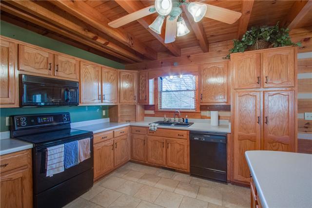 51 Cages Bend Lane Riddleton, TN 37151 - Photo 9 of 20 a kitchen with lots of counter top space