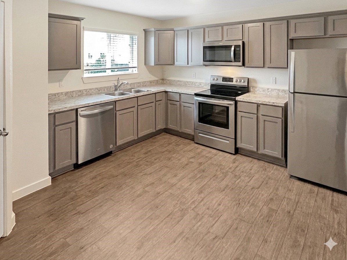 12603 Telge Road, Unit 8EH Cypress, TX 77429 - Photo 10 of 32 a kitchen with stainless steel appliances granite countertop a stove a sink and a refrigerator