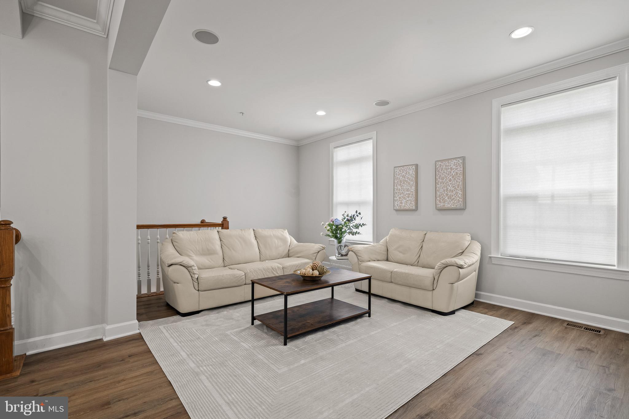 7704 Water Street Fulton, MD 20759 - Photo 11 of 45 a living room with furniture and a window
