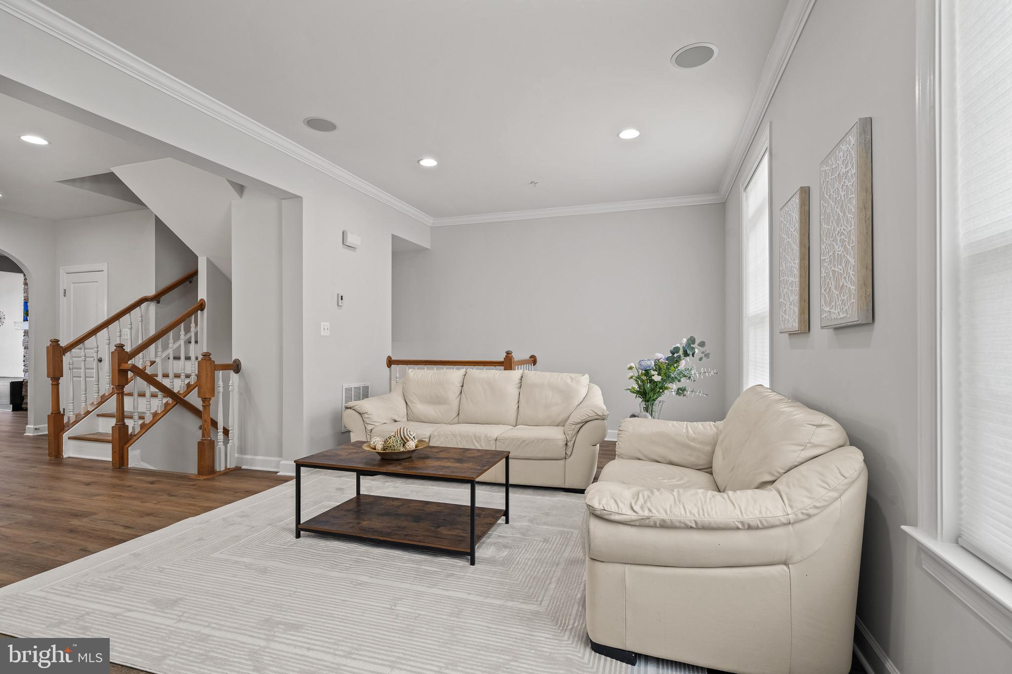 7704 Water Street Fulton, MD 20759 - Photo 12 of 45 a living room with furniture and a potted plant