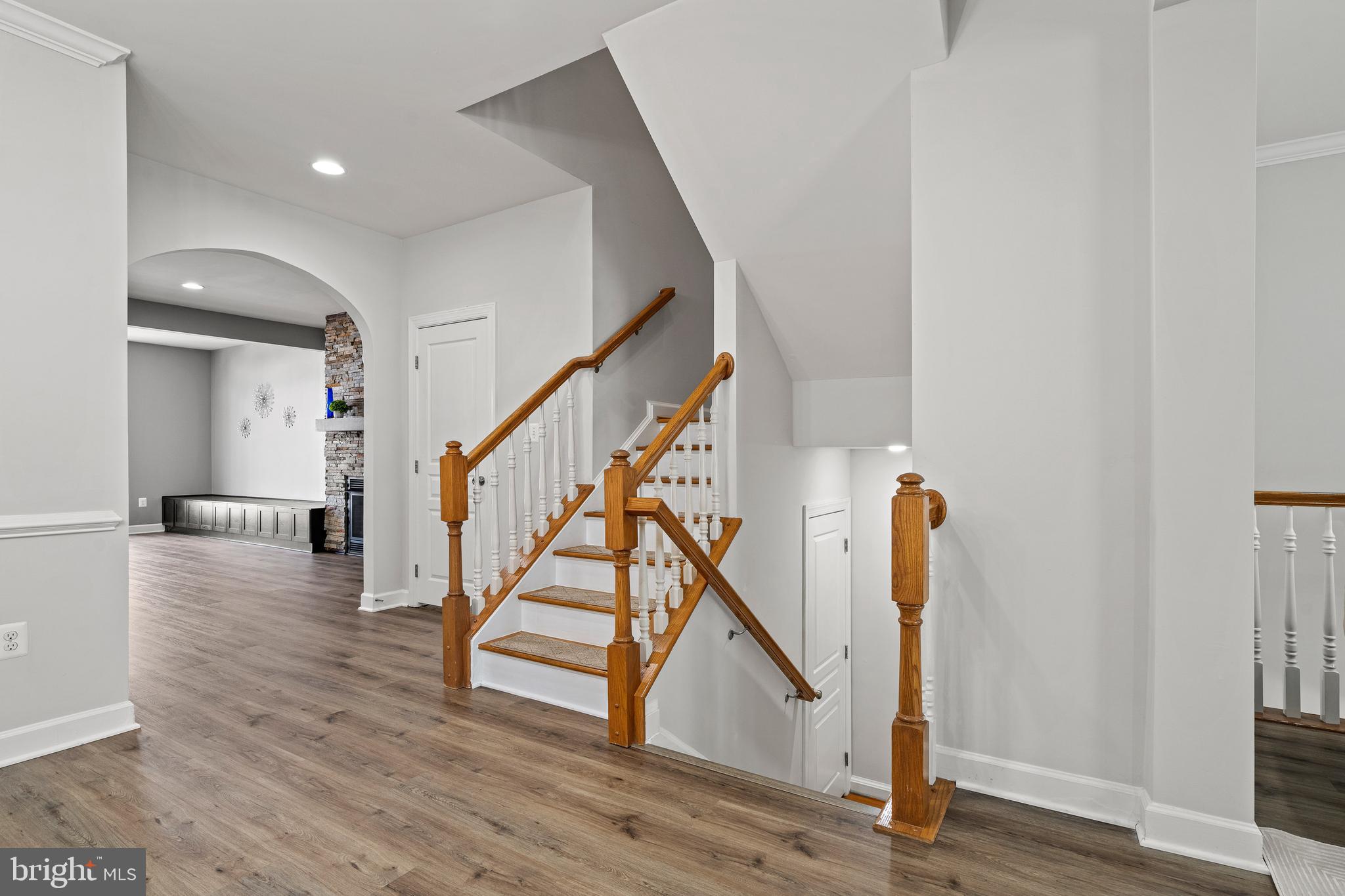 7704 Water Street Fulton, MD 20759 - Photo 15 of 45 a view of entryway and hall with wooden floor