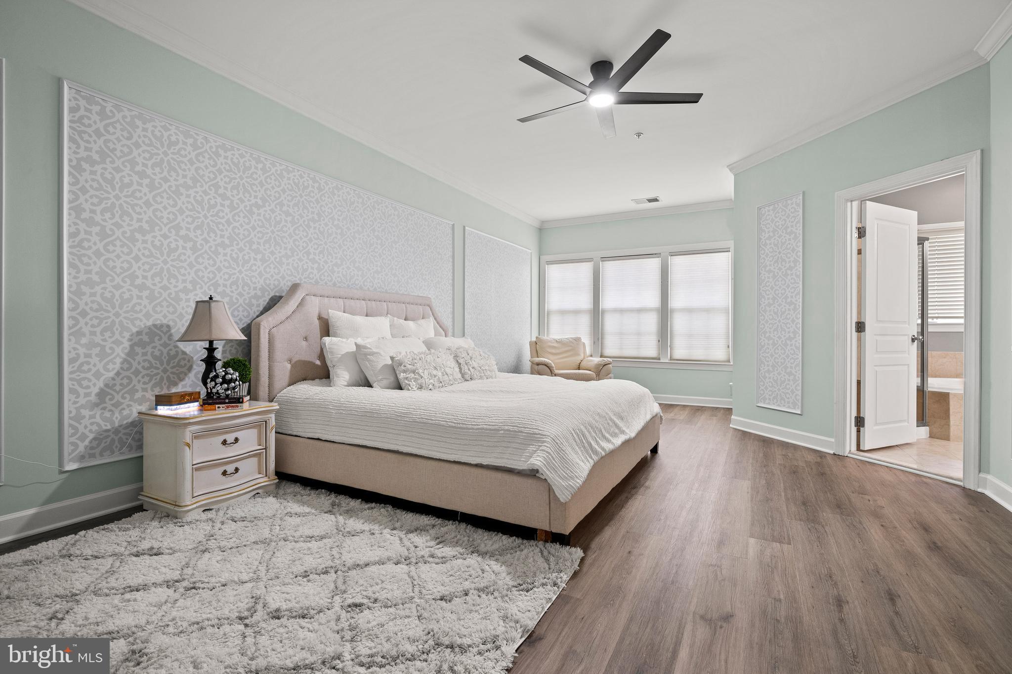 7704 Water Street Fulton, MD 20759 - Photo 17 of 45 a bedroom with a large bed and a window