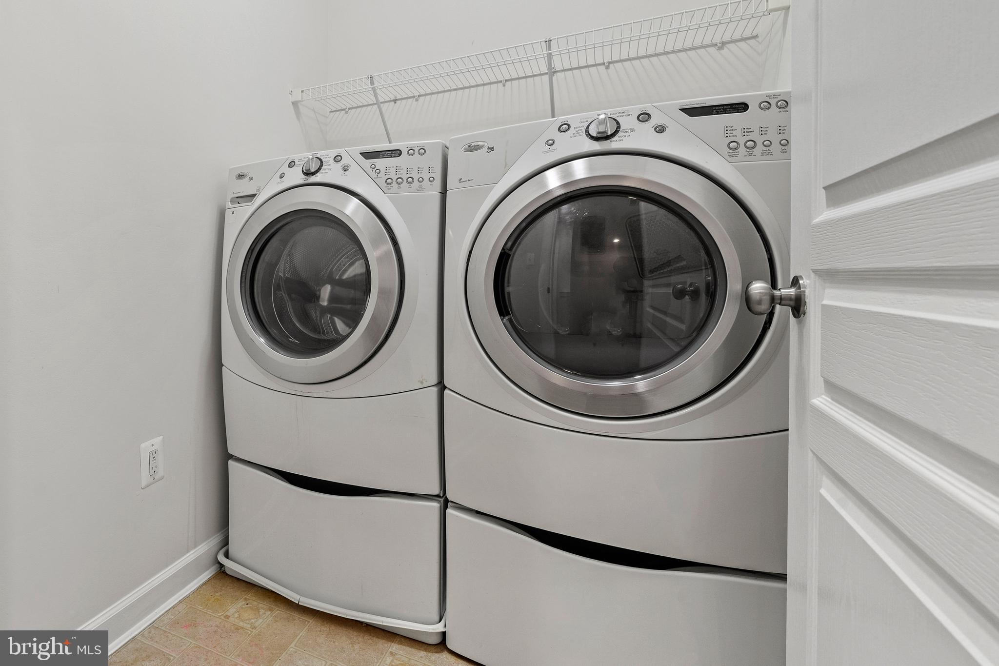 7704 Water Street Fulton, MD 20759 - Photo 36 of 45 a utility room with dryer and washer