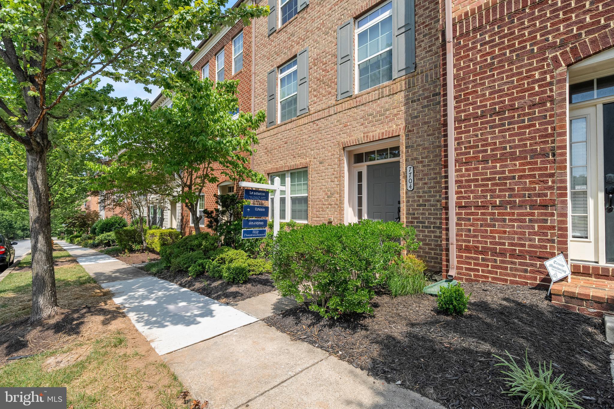 7704 Water Street Fulton, MD 20759 - Photo 38 of 45 a front view of a house with garden