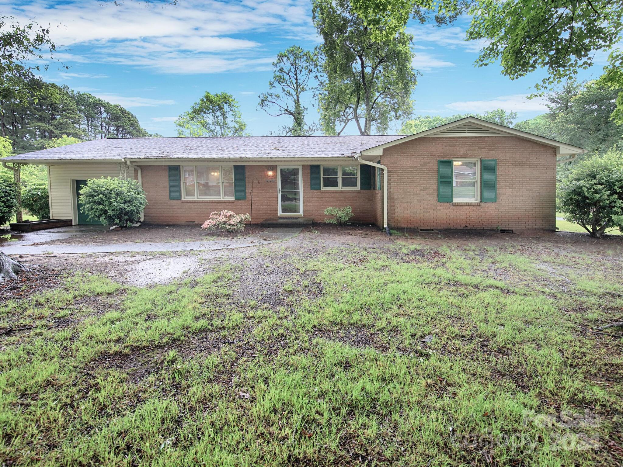 front view of a house with a yard
