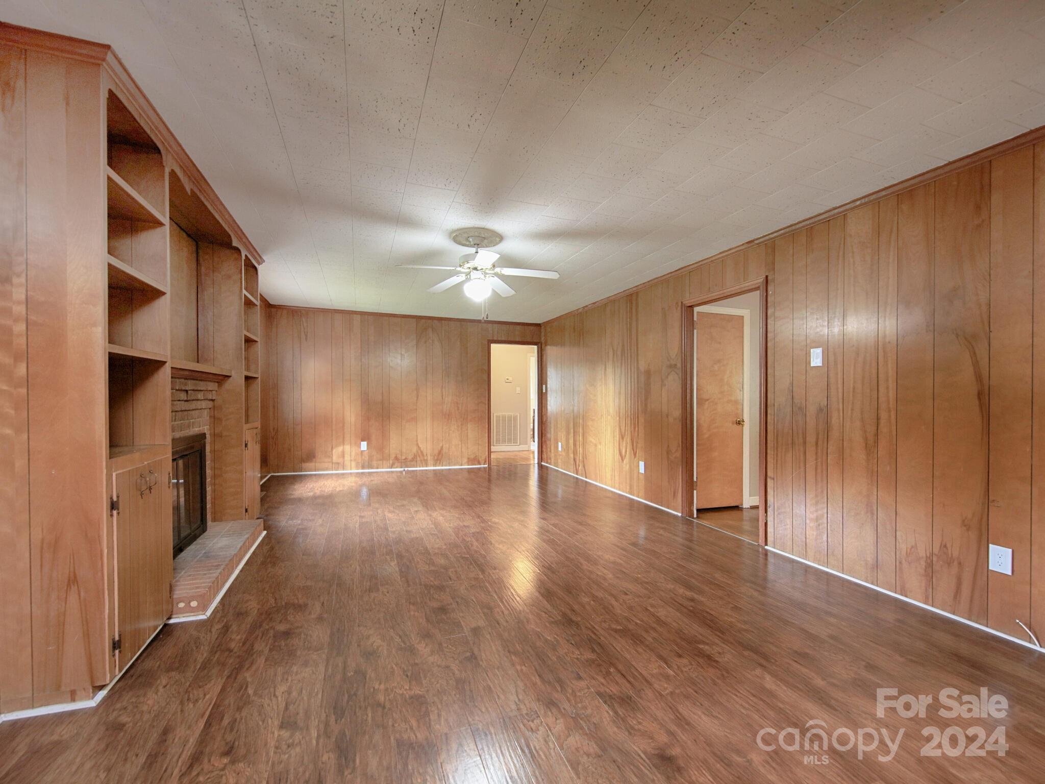 446 Fieldstone Road Mooresville, NC 28115 - Photo 16 of 30 a view of empty room with wooden floor