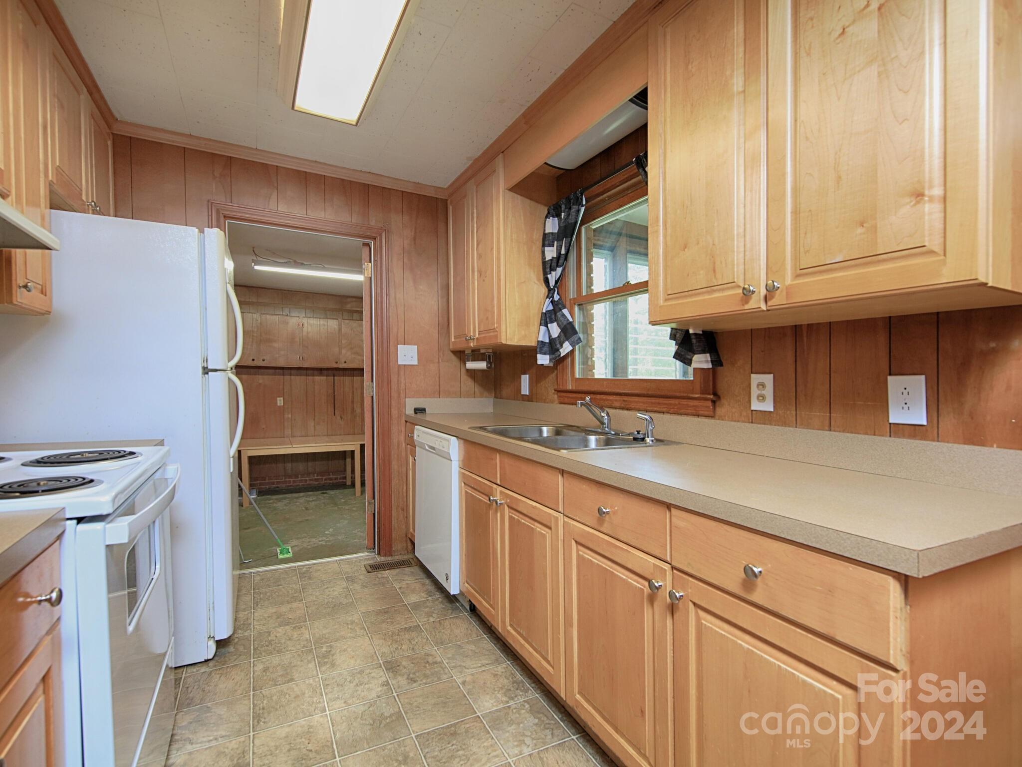 446 Fieldstone Road Mooresville, NC 28115 - Photo 17 of 30 a kitchen with a sink and cabinets