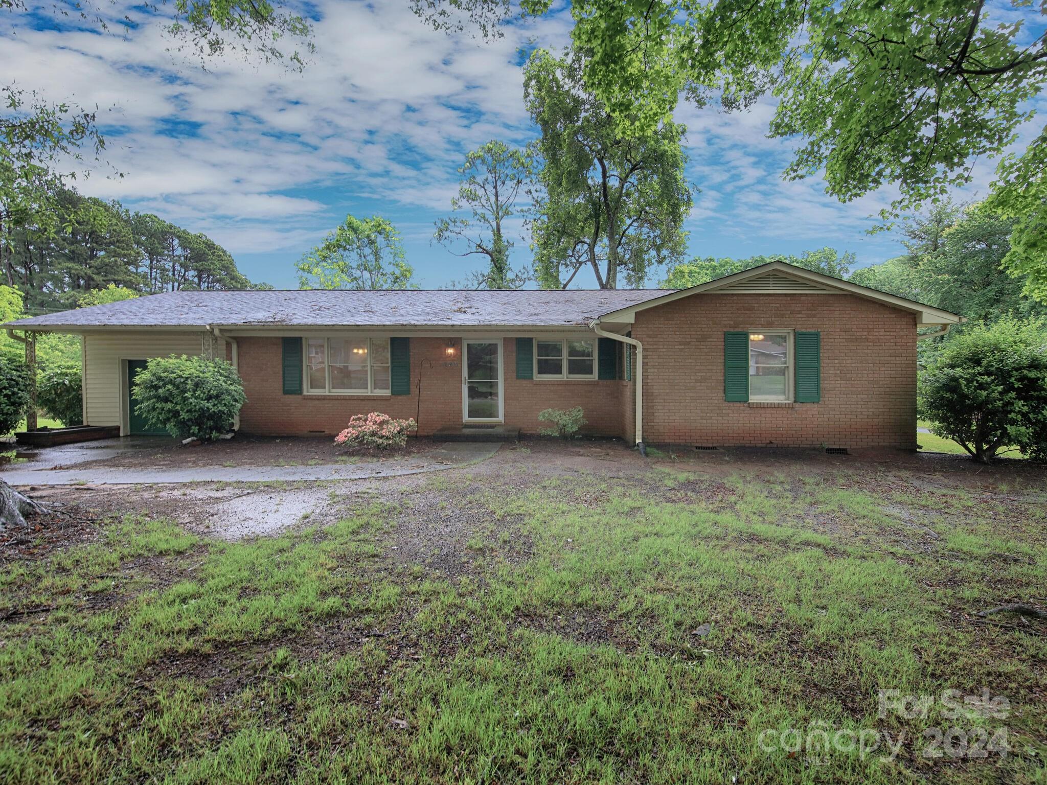 446 Fieldstone Road Mooresville, NC 28115 - Photo 2 of 30 a view of a house with backyard and garden