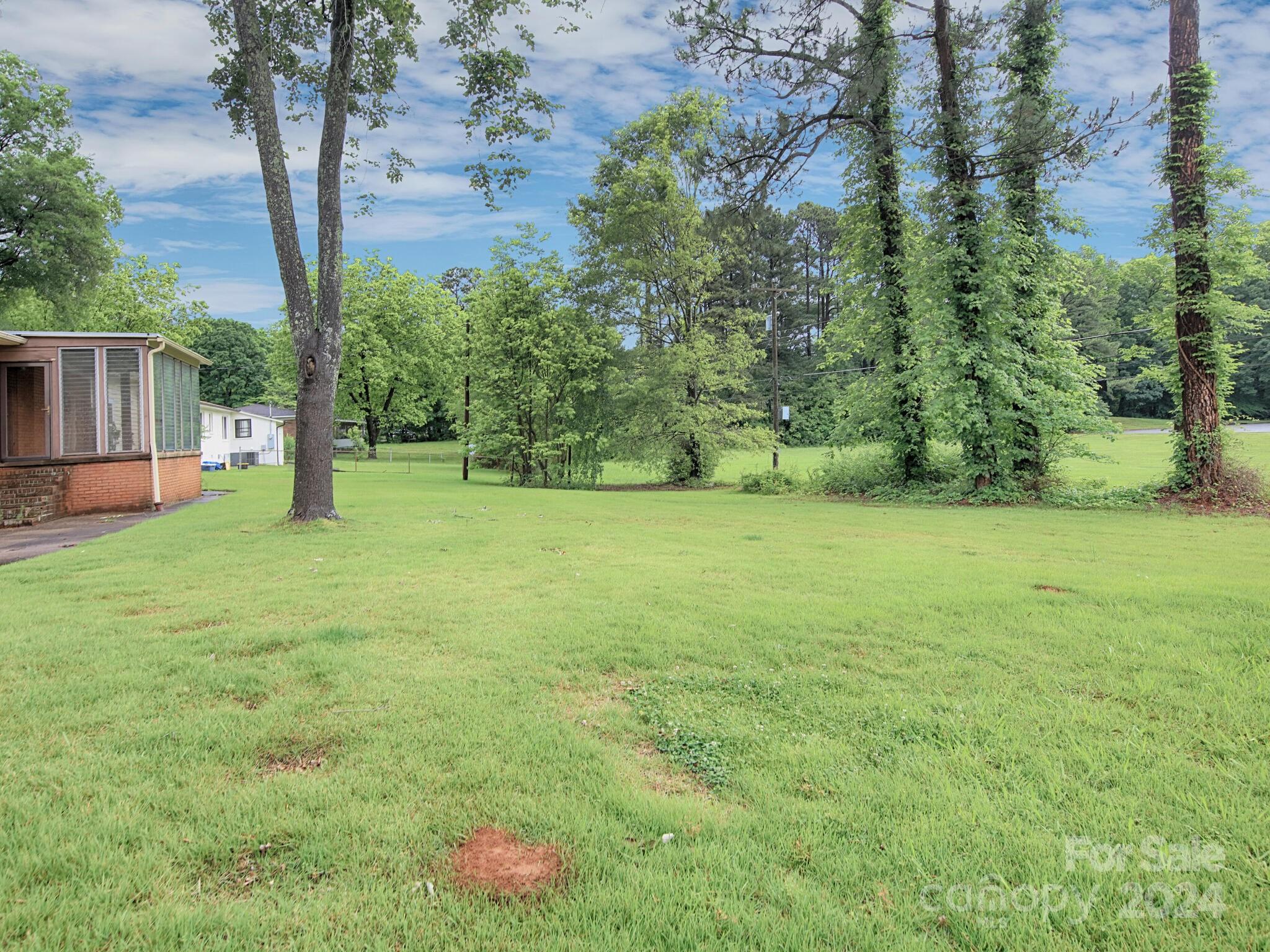 446 Fieldstone Road Mooresville, NC 28115 - Photo 26 of 30 a backyard of a house with lots of green space