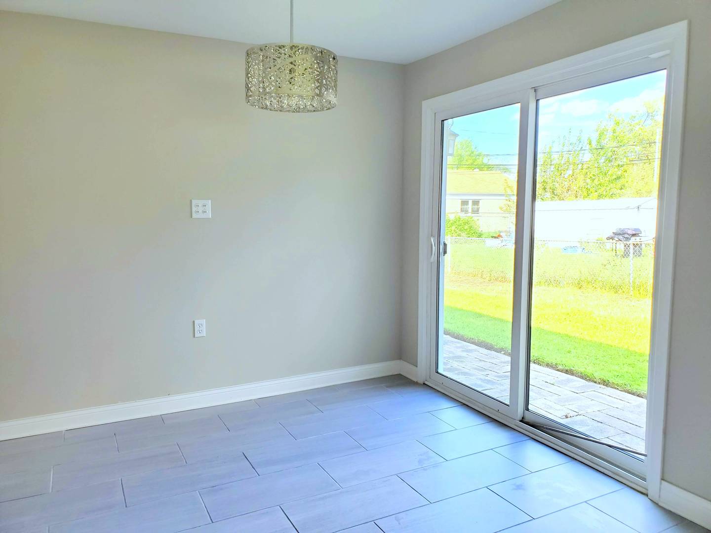 6106 Birmingham Street Chicago Ridge, IL 60415 - Photo 11 of 31 a view of an empty room and window