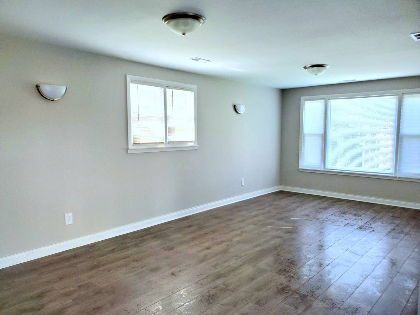 6106 Birmingham Street Chicago Ridge, IL 60415 - Photo 15 of 31 an empty room with wooden floor and windows