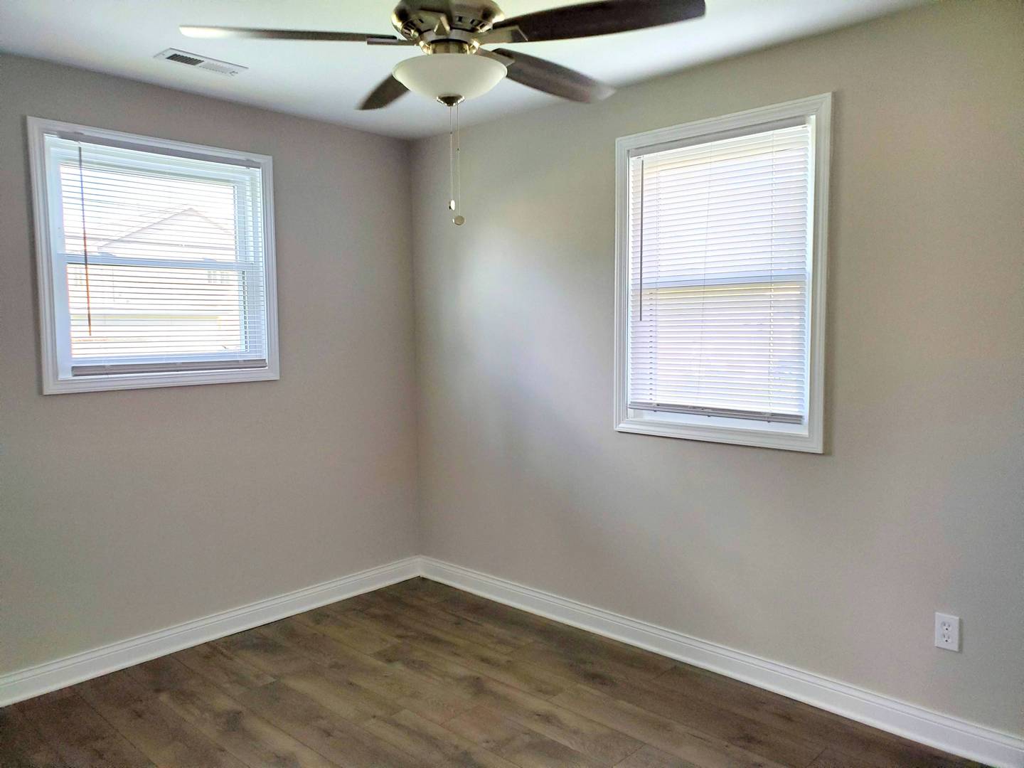 6106 Birmingham Street Chicago Ridge, IL 60415 - Photo 20 of 31 an empty room with a window and a fan