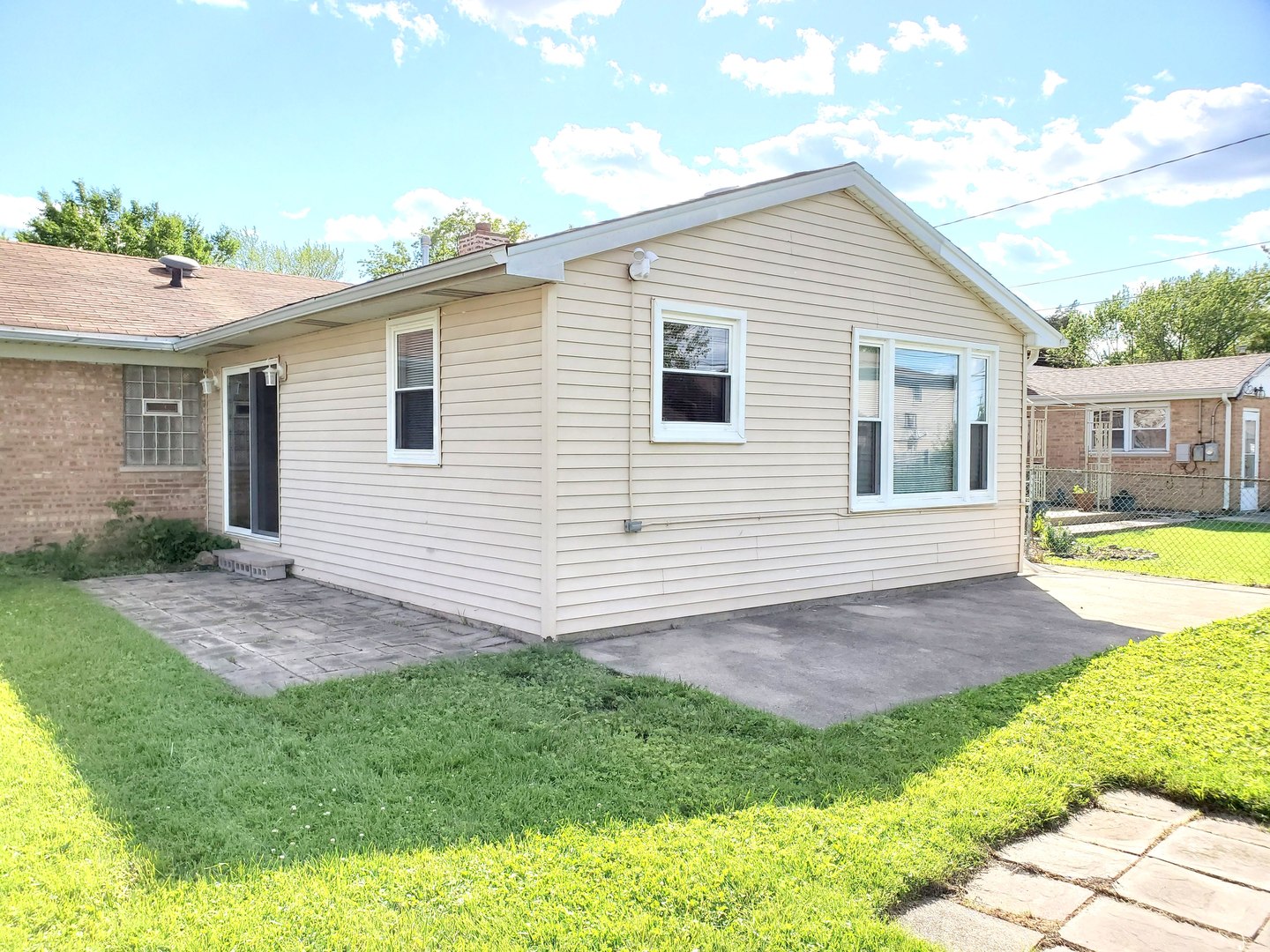 6106 Birmingham Street Chicago Ridge, IL 60415 - Photo 25 of 31 a view of a backyard with plants and a patio