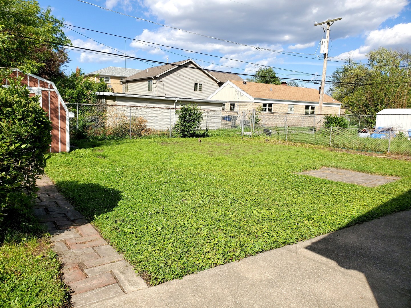 6106 Birmingham Street Chicago Ridge, IL 60415 - Photo 28 of 31 a view of a back yard of the house