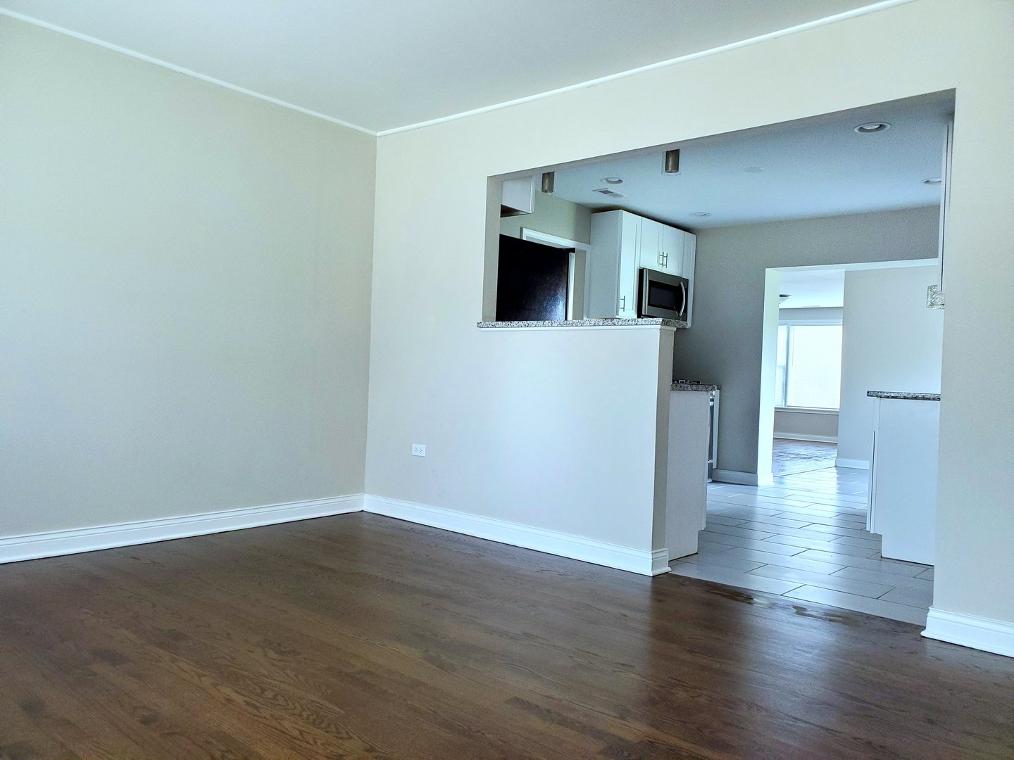 6106 Birmingham Street Chicago Ridge, IL 60415 - Photo 5 of 31 a view of a livingroom with wooden floor