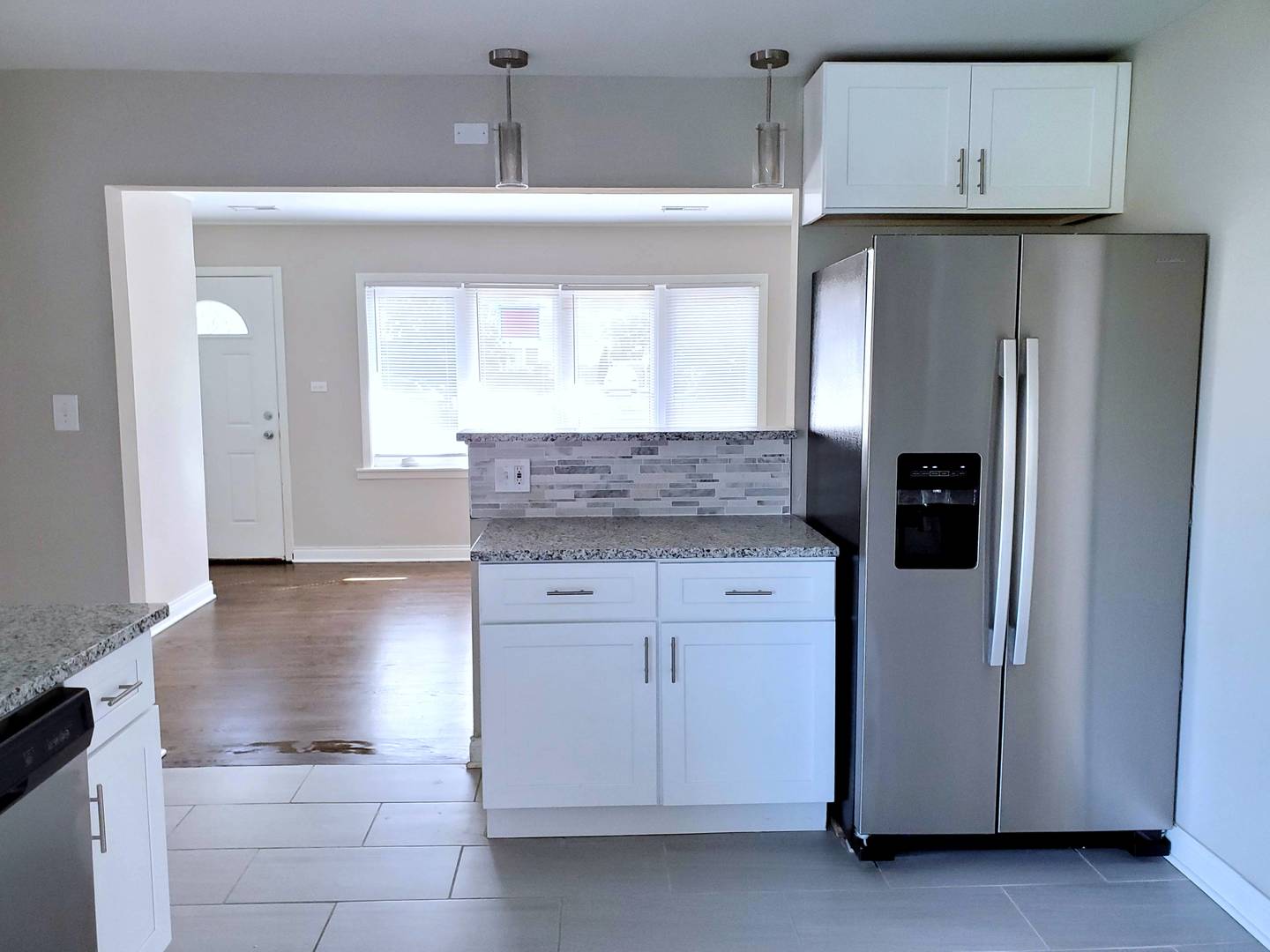 6106 Birmingham Street Chicago Ridge, IL 60415 - Photo 6 of 31 a kitchen with stainless steel appliances granite countertop a refrigerator and a stove