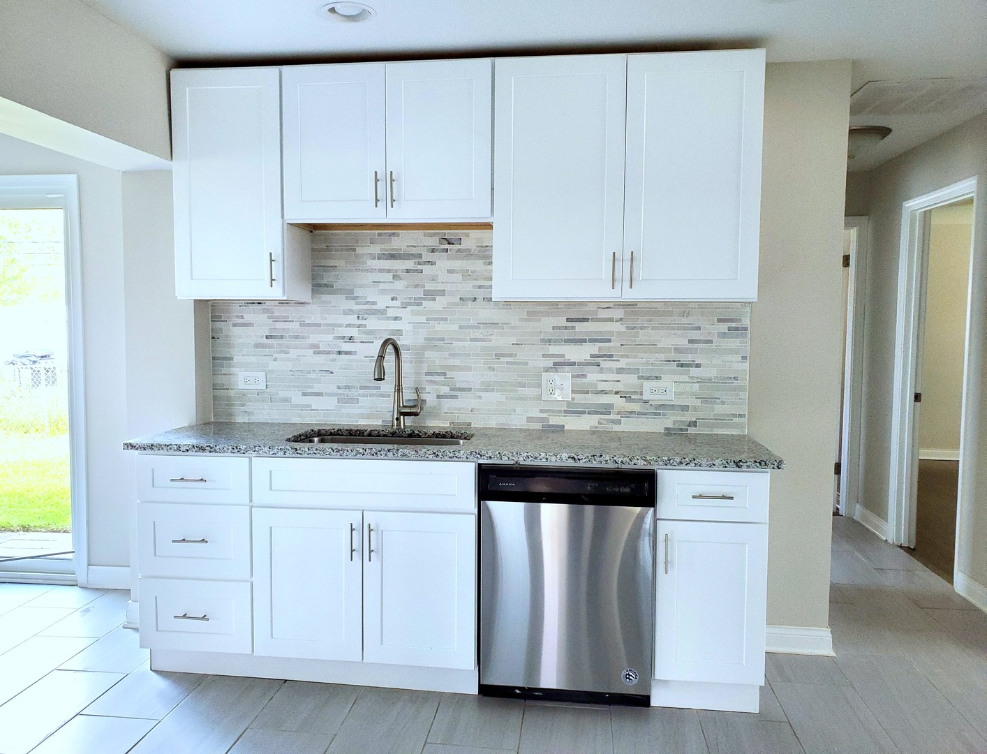 6106 Birmingham Street Chicago Ridge, IL 60415 - Photo 8 of 31 a kitchen with white cabinets