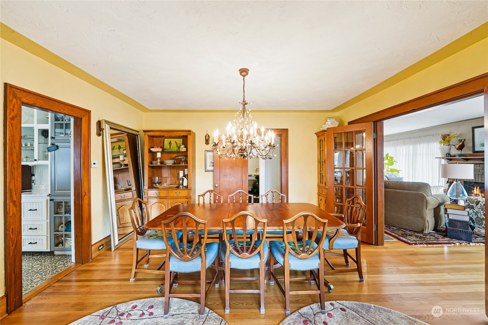 5918 Sunset Avenue Anacortes, WA 98221 - Photo 12 of 38 a room with lots of white furniture and chandelier