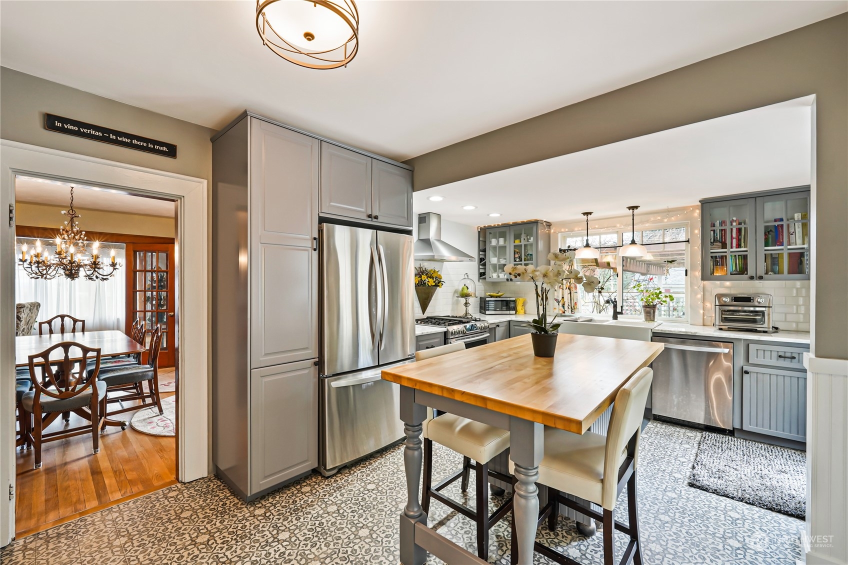 5918 Sunset Avenue Anacortes, WA 98221 - Photo 13 of 38 a kitchen with stainless steel appliances granite countertop a refrigerator and a stove top oven