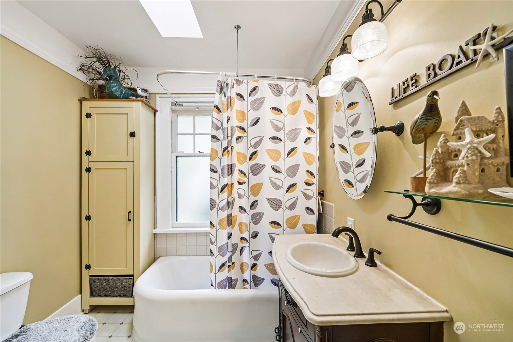 5918 Sunset Avenue Anacortes, WA 98221 - Photo 20 of 38 a bathroom with a sink and a mirror