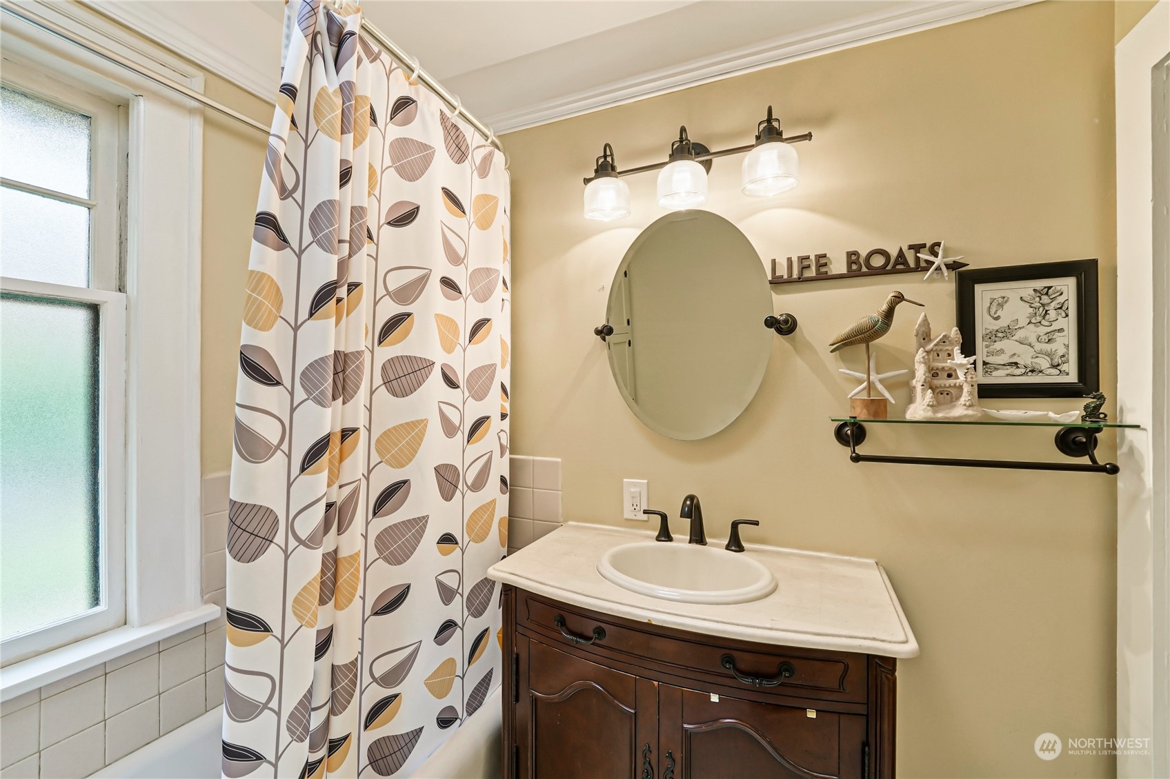 5918 Sunset Avenue Anacortes, WA 98221 - Photo 21 of 38 a bathroom with a sink and a mirror