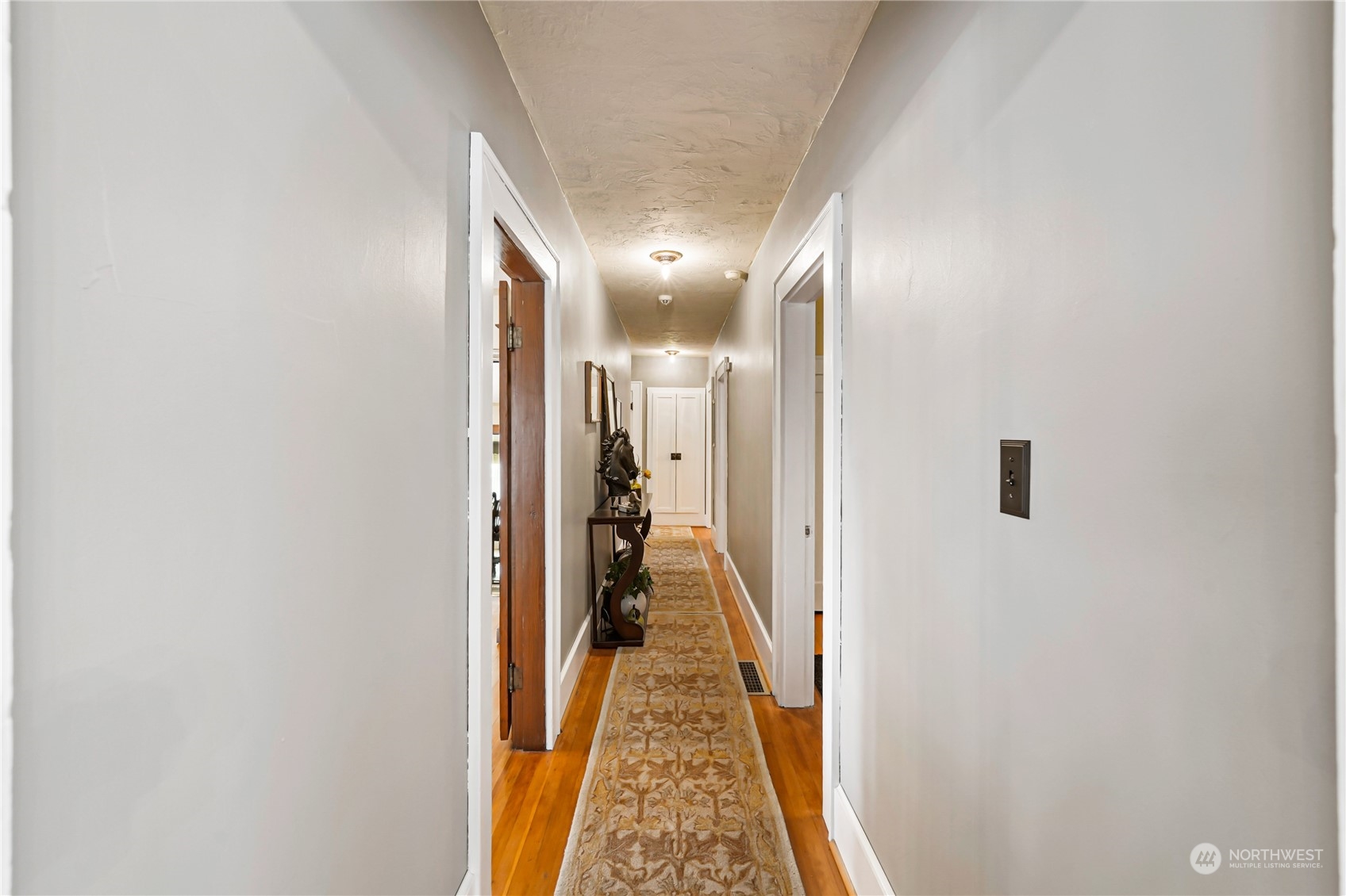 5918 Sunset Avenue Anacortes, WA 98221 - Photo 23 of 38 a view of a hallway with a living room