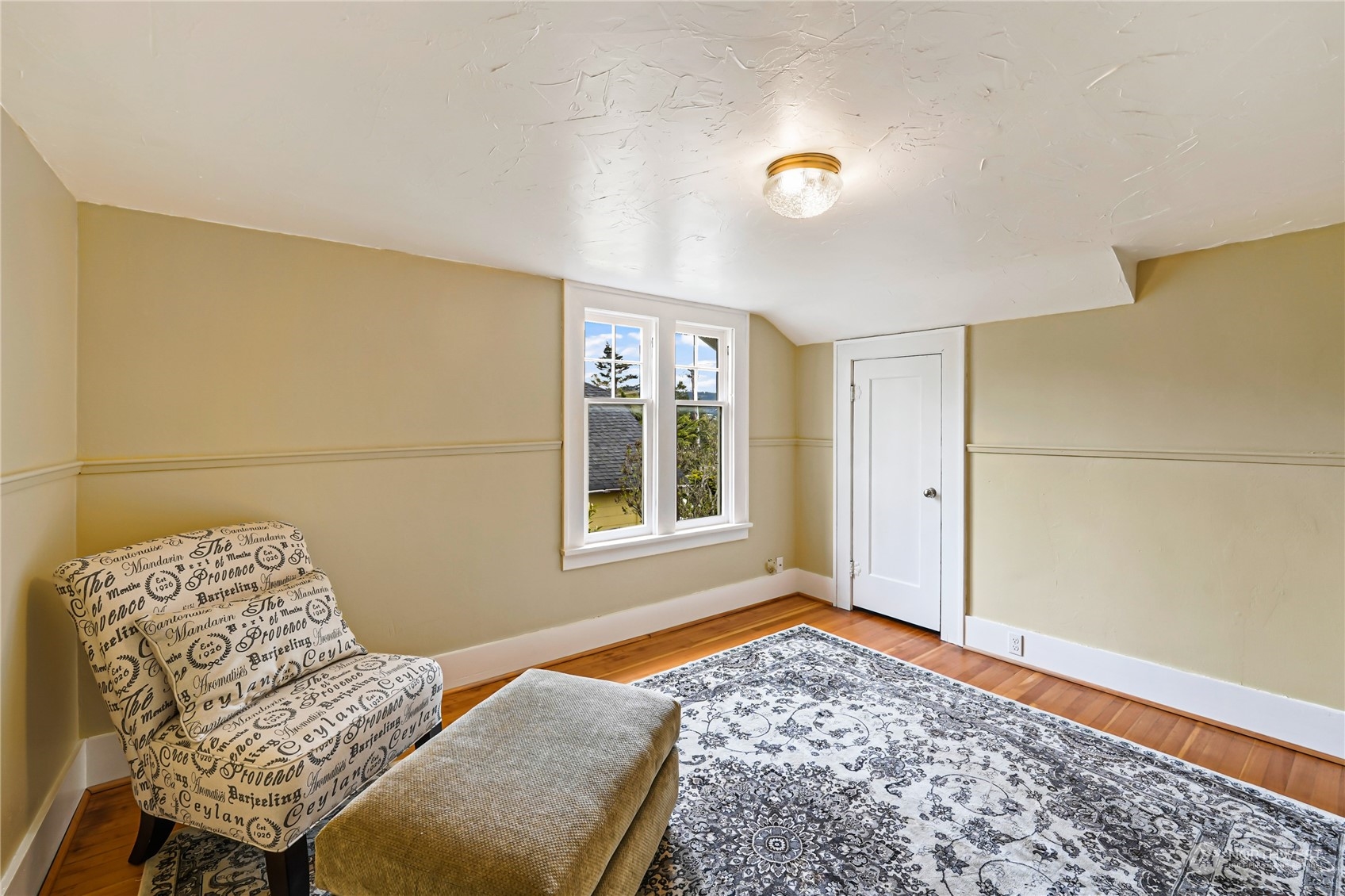 5918 Sunset Avenue Anacortes, WA 98221 - Photo 27 of 38 a bedroom with a bed and a window
