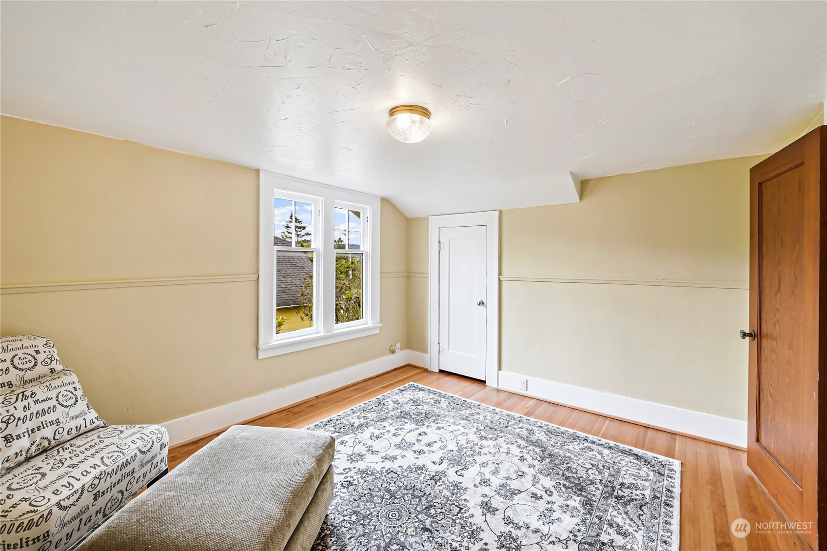 5918 Sunset Avenue Anacortes, WA 98221 - Photo 28 of 38 a bedroom with a bed and a window with bathroom